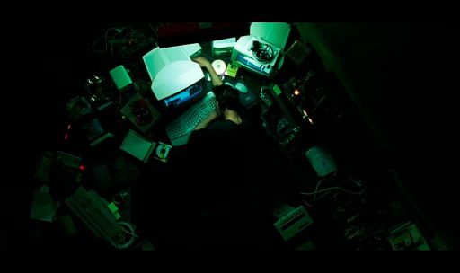 The iconic moment Neo's terminal delivers the reality-shattering message, "Wake up, Neo..." signaling his first direct contact with the world outside the simulation and the beginning of his journey to uncover the Matrix.